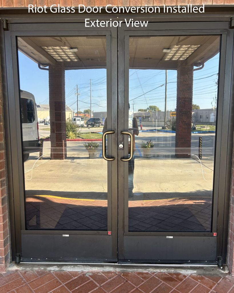 Riot Glass Door Conversion Security Panels on a Dallas storefront