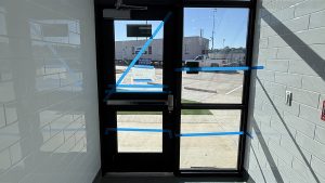 3M Security Window Film protecting a school entryway in Kennedale, TX