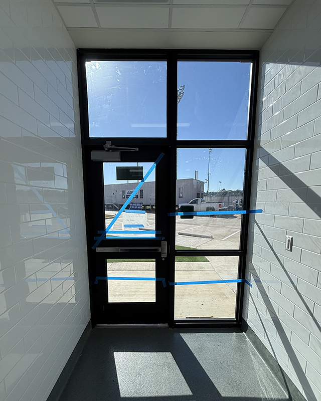 Anchored Security Window Film protecting an entryway in Kennedale, TX