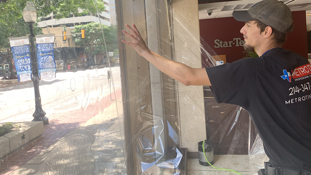 Business Security Window Film being installed