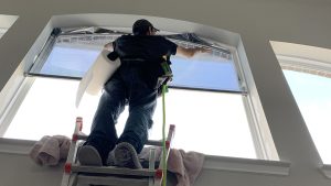 Home Window Tint being installed for Glare Reduction